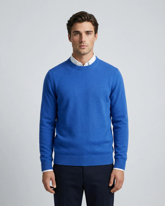 Men's cashmere crewneck sweater in blue by Ilynora, front view with classic fit and soft knit texture