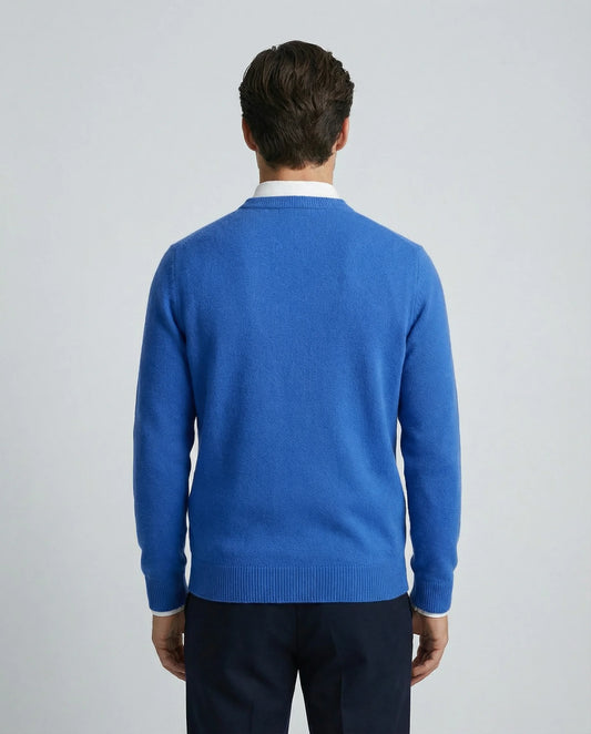 Blue cashmere sweater for men by Ilynora, back view highlighting clean silhouette and refined design