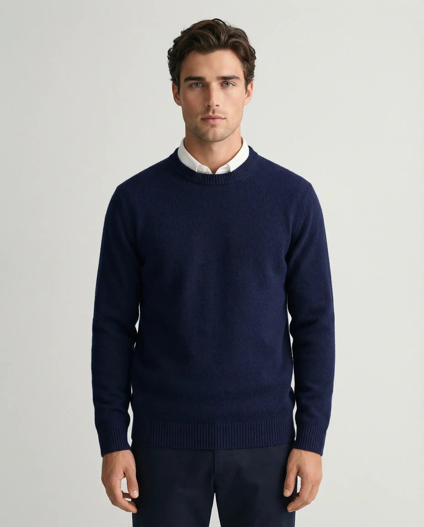 Men's cashmere crewneck sweater in navy blue by Ilynora, front view with timeless fit and premium knit