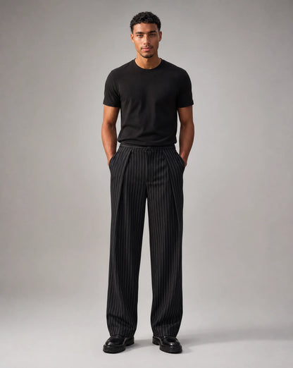 Men's black pinstripe trousers with wide leg design and contemporary smart casual styling by ILYNORA