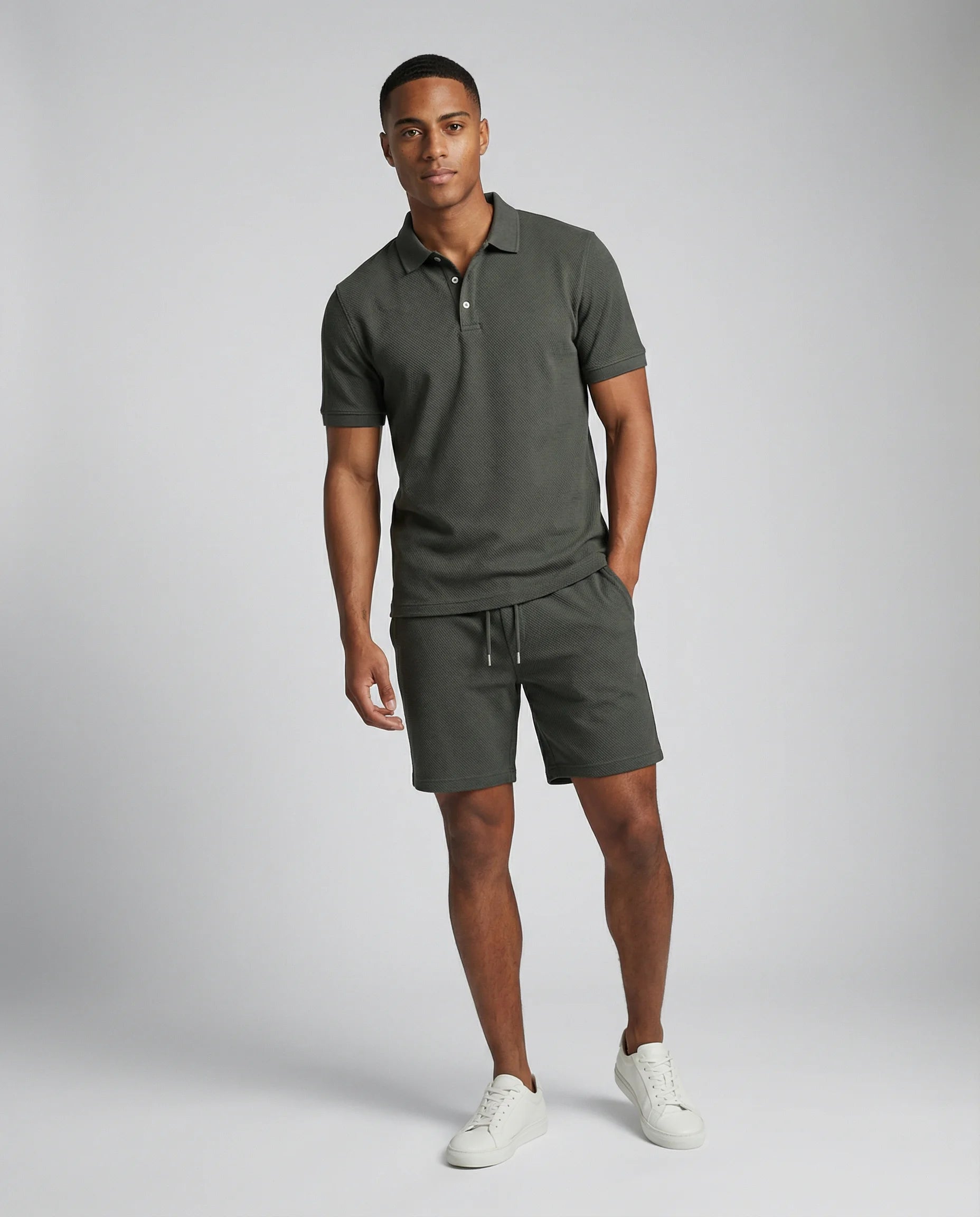 Men's polo shirt and shorts summer set in dark grey by Ilynora, front view with clean silhouette and relaxed fit