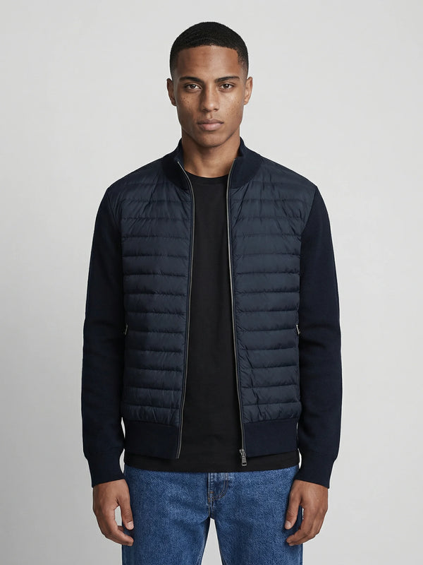Men's quilted knit bomber jacket in navy blue by Ilynora, front view with padded panel and clean silhouette