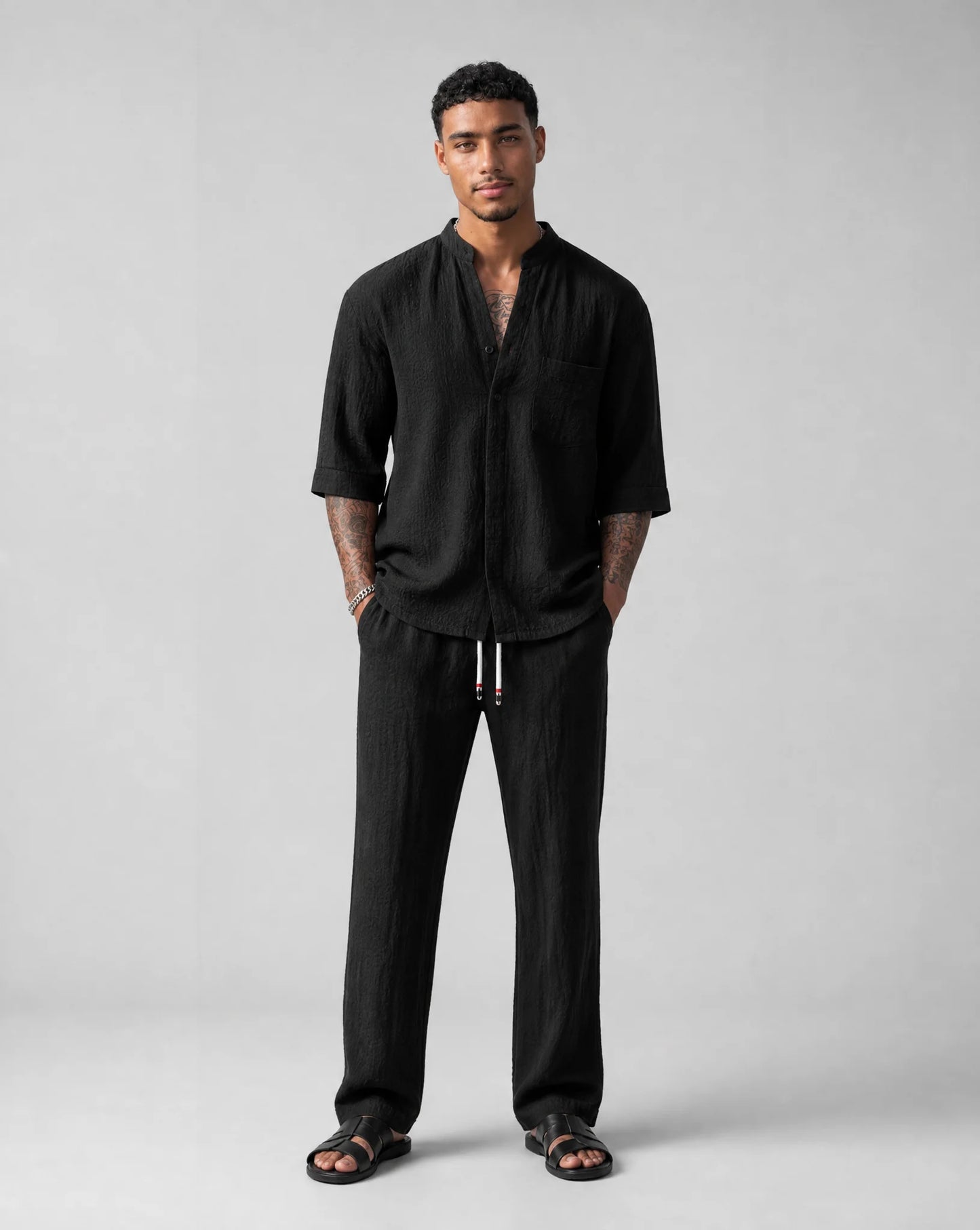 Men's black relaxed linen two-piece set front view by ILYNORA