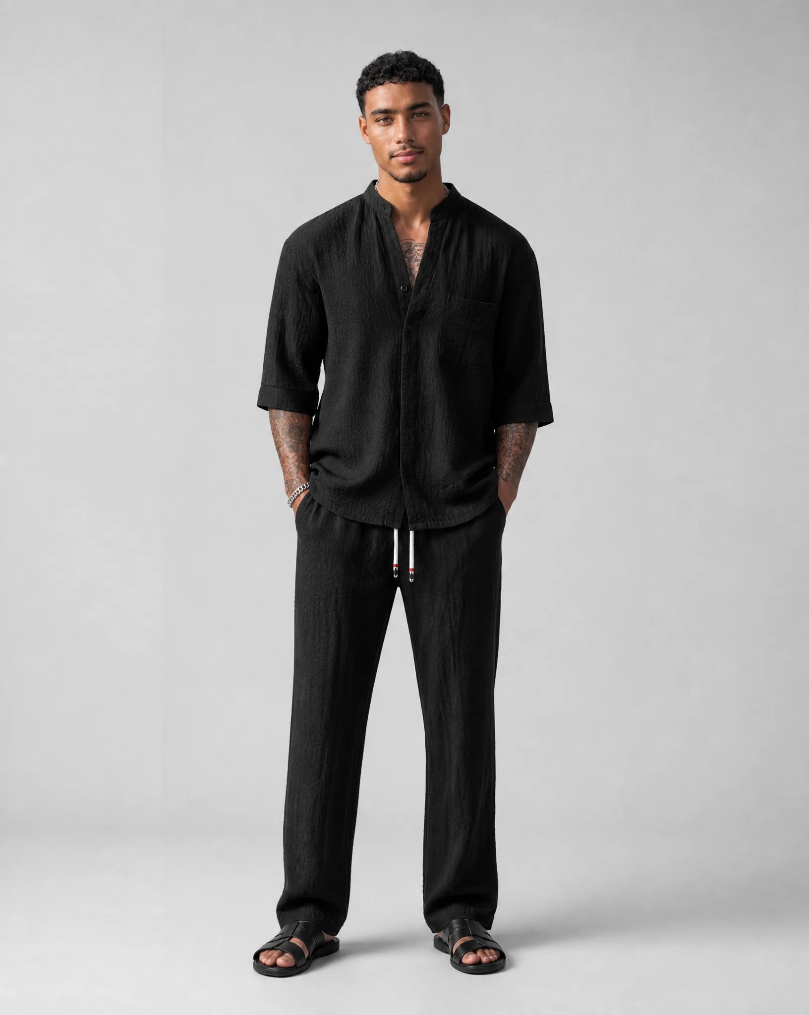 Men's black relaxed linen two-piece set front view by ILYNORA