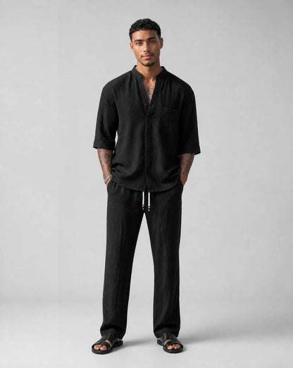 Men's black relaxed linen two-piece set front view by ILYNORA