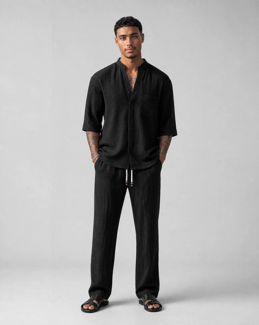 Men's black relaxed linen two-piece set front view by ILYNORA
