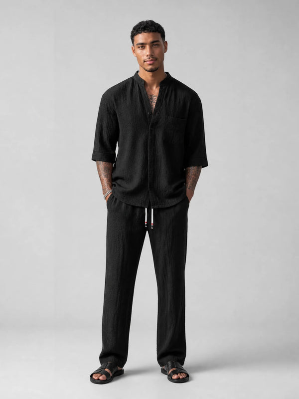 Men's black relaxed linen two-piece set front view by ILYNORA