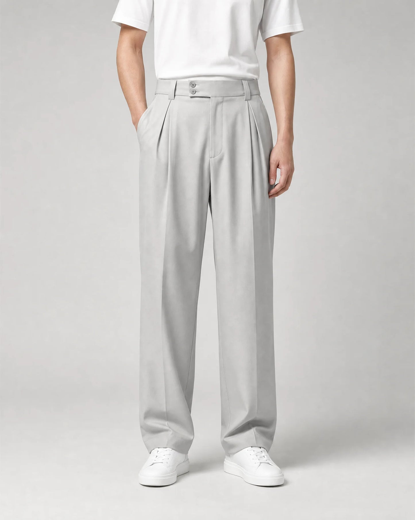 Men's silver wide leg pleated tailored trousers featuring a high waist, flowing drape and modern smart-casual tailoring by ILYNORA