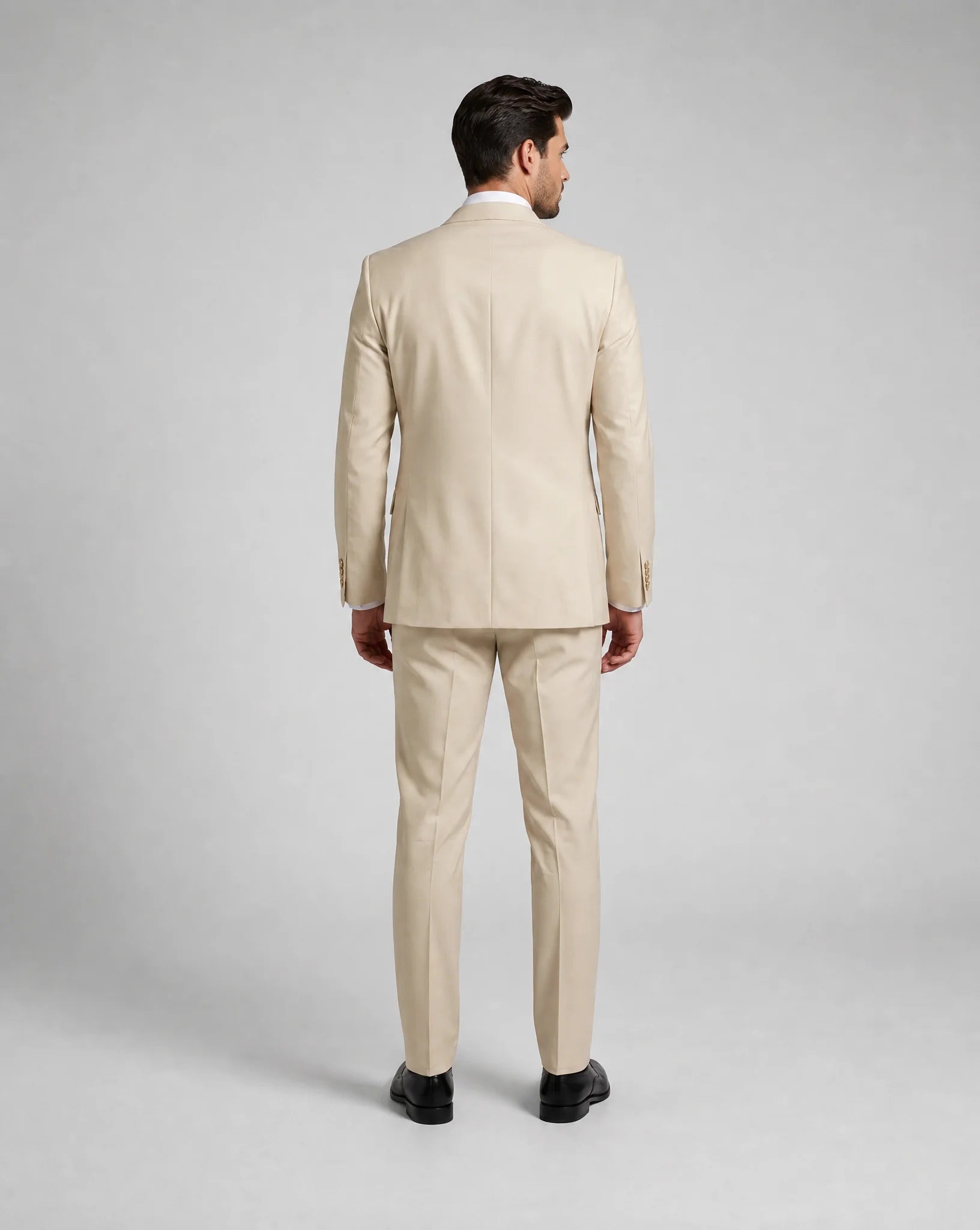 Beige slim fit three piece suit back view with modern tailored fit and formal styling by ILYNORA
