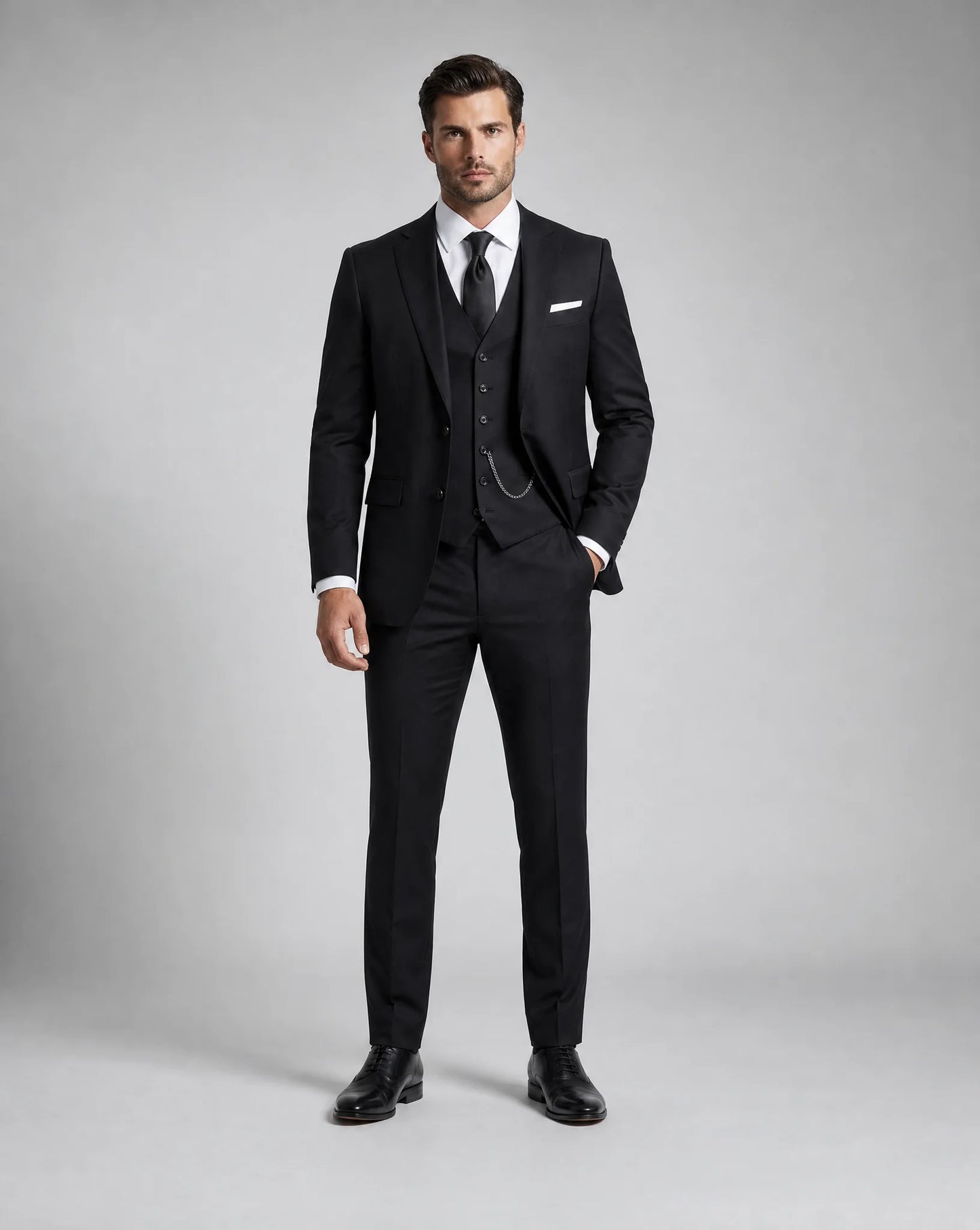 Black slim fit three piece wedding suit with tailored blazer waistcoat and trousers by ILYNORA