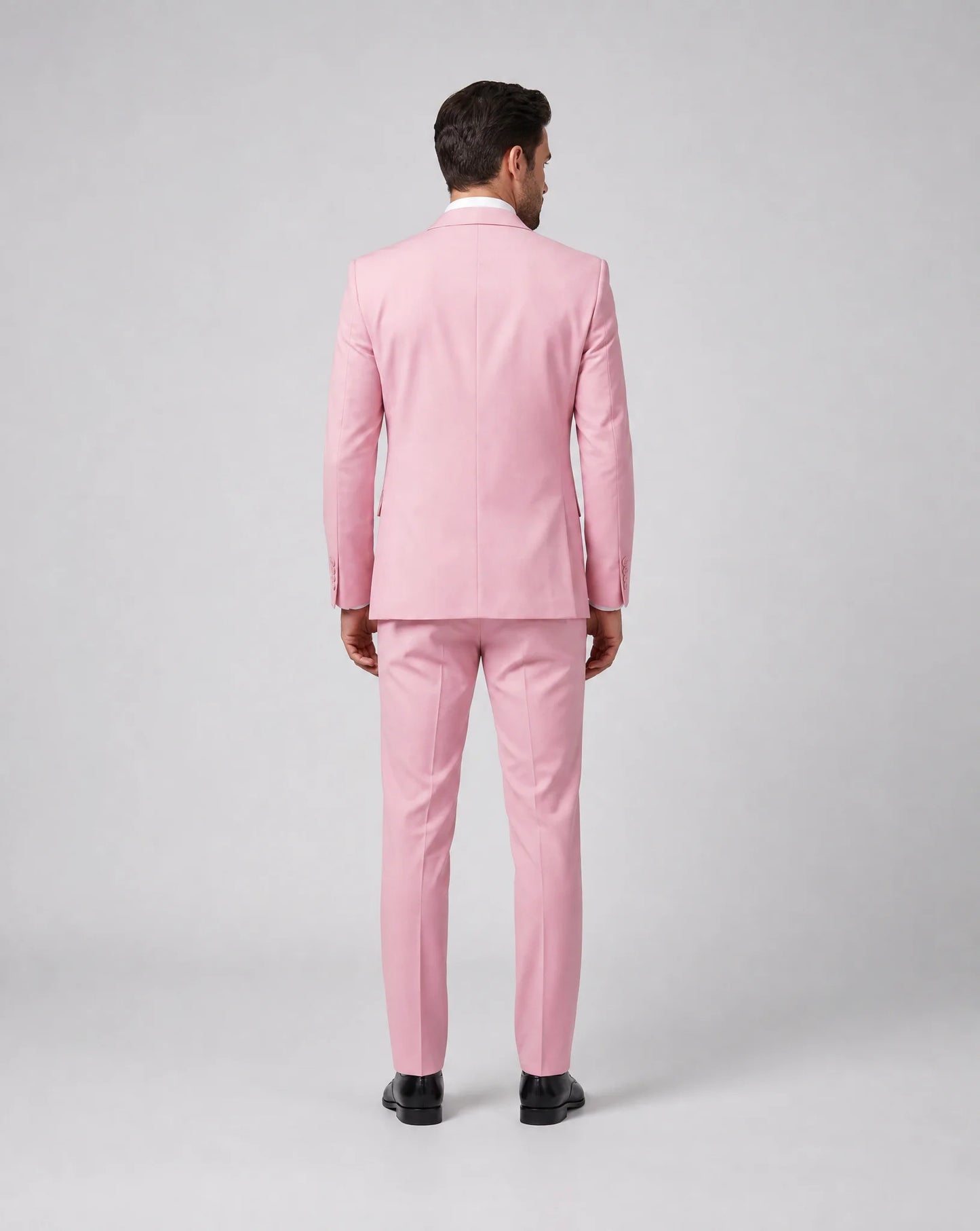 Pink slim fit three piece suit back view with modern formal occasion styling by ILYNORA