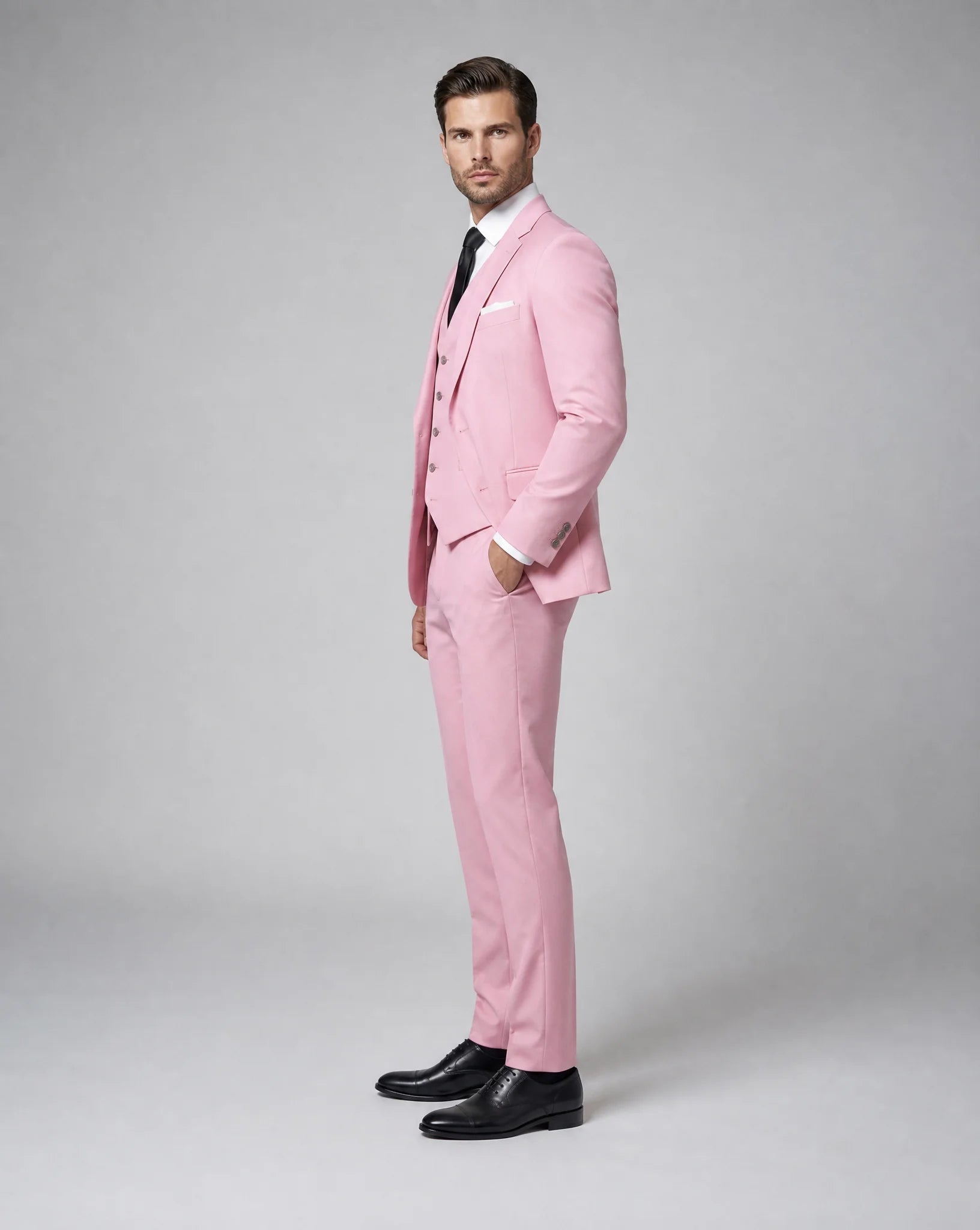 Pink slim fit three piece wedding suit side view with tailored silhouette by ILYNORA