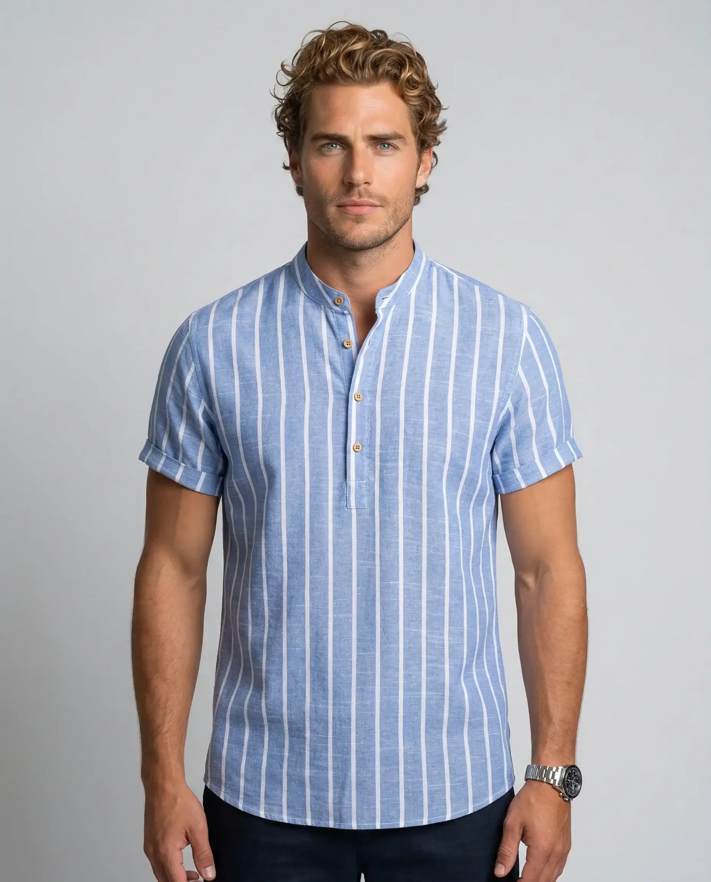 Men's striped sailor cotton polo shirt in blue by Ilynora, front view with vertical stripes and relaxed fit