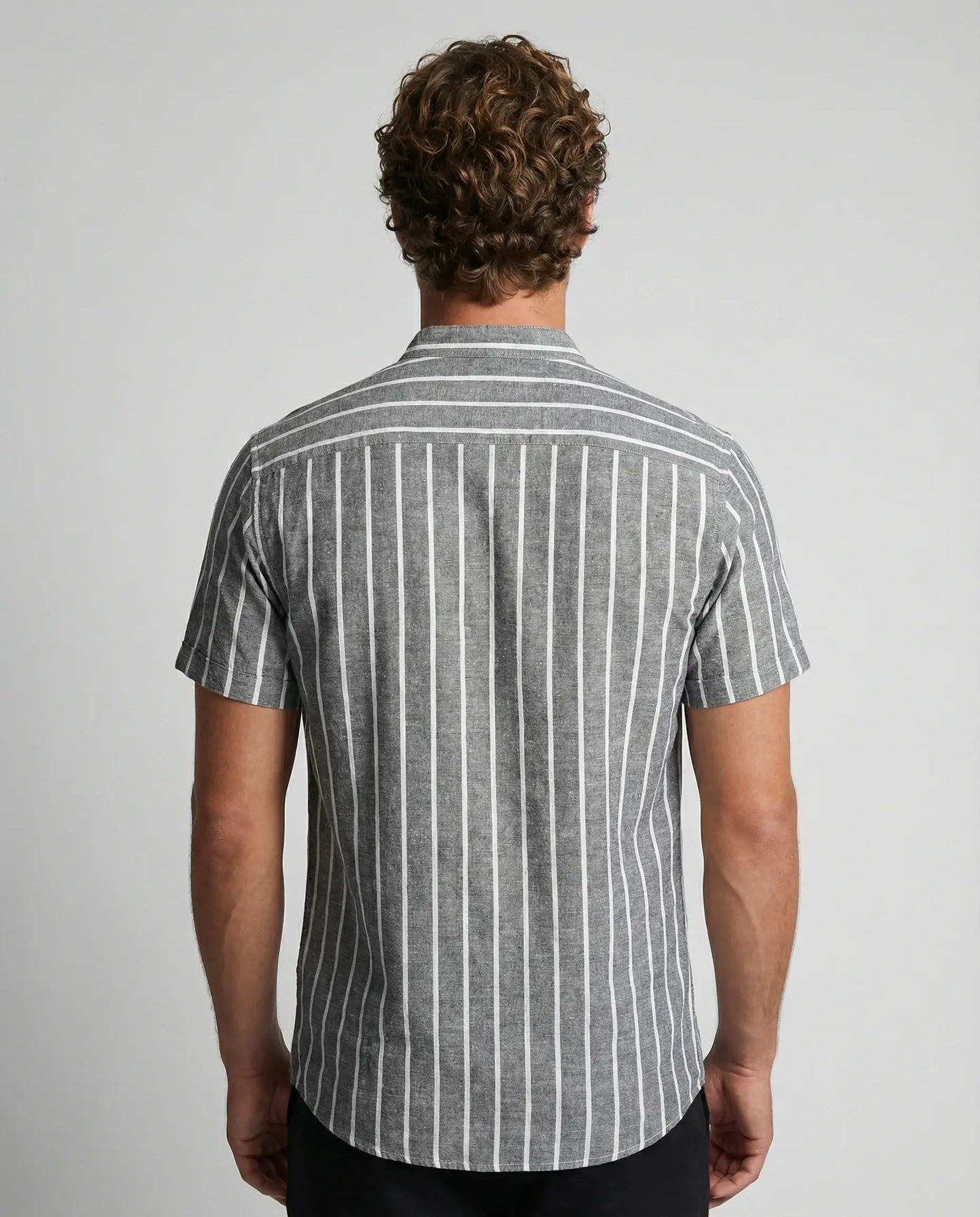 Grey striped cotton polo shirt by Ilynora, back view showing breathable fabric and refined look