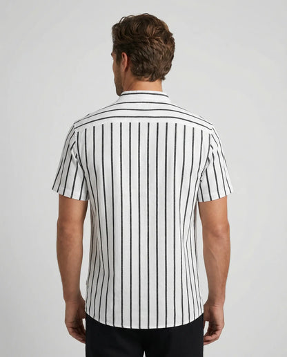 White striped polo shirt by Ilynora, back view highlighting clean design and lightweight cotton fabric