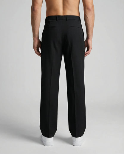Black wide leg trousers by Ilynora, back view with structured design and modern tailoring