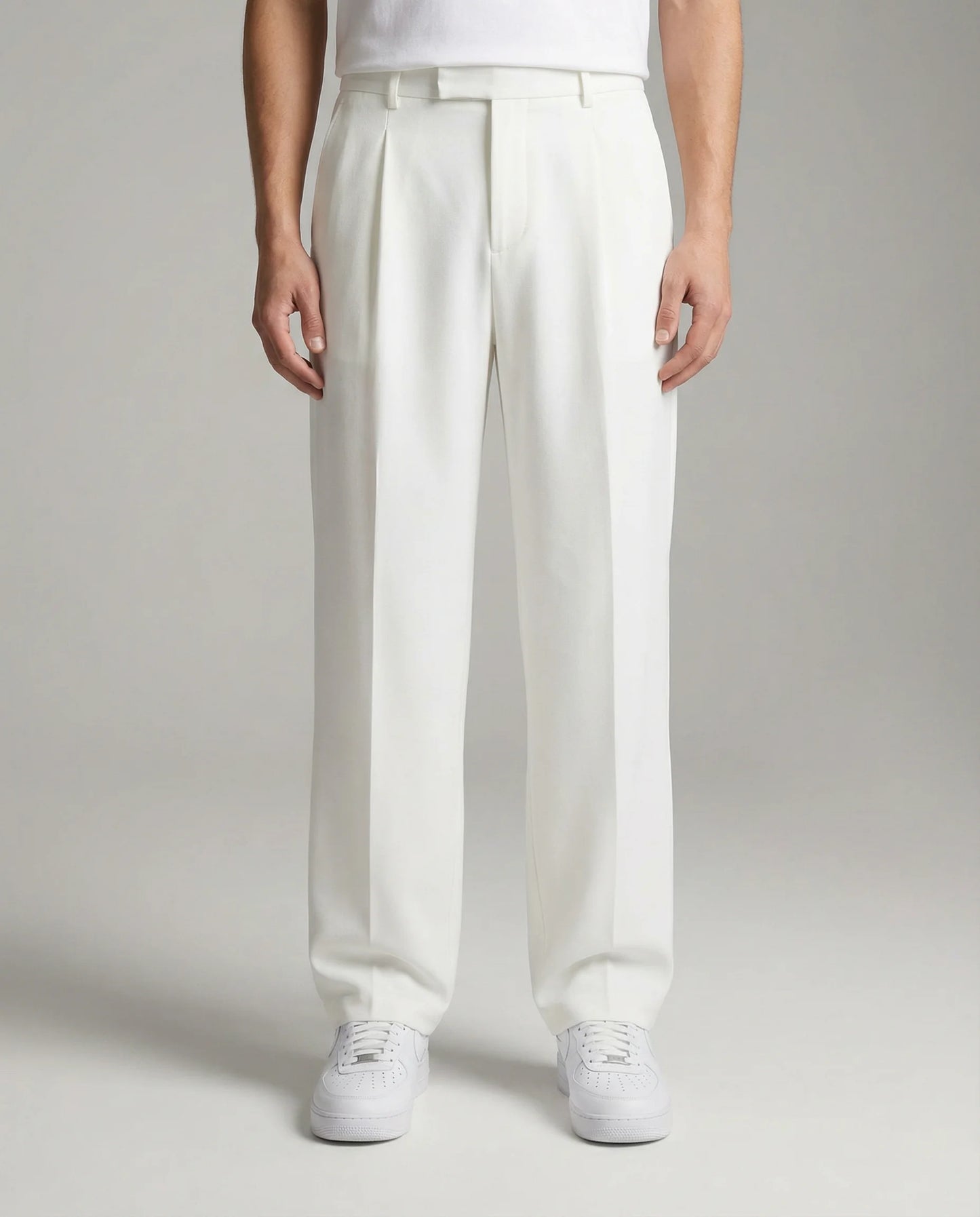 White tailored wide leg trousers for men by Ilynora, front view with refined fit and lightweight feel