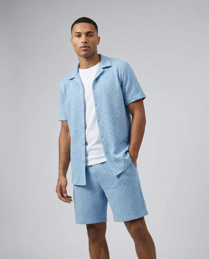 Blue textured shirt and shorts set for men by Ilynora, front view highlighting relaxed fit and breathable material