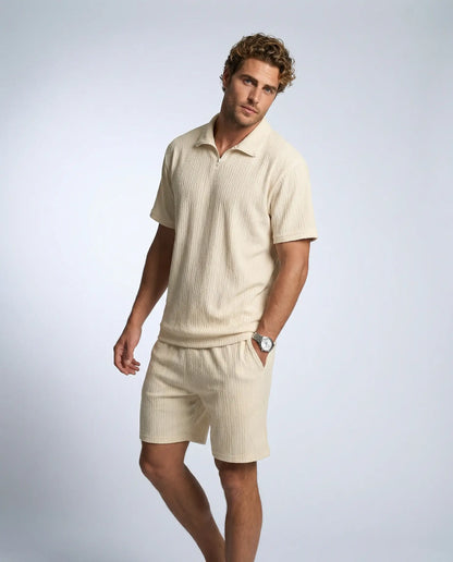 Men's textured zip polo and shorts set in beige by Ilynora, front view with lightweight fabric and modern silhouette