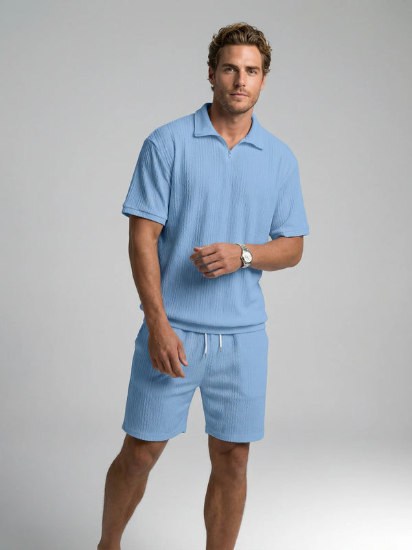 Men's textured zip polo and shorts set in blue by Ilynora, front view with relaxed fit and clean summer look