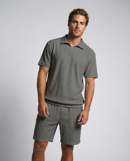 Grey textured zip polo and shorts set by Ilynora, front view with relaxed fit and minimal style