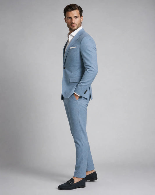 Men's aqua blue linen wedding suit with breathable fabric and refined destination wedding style by ILYNORA
