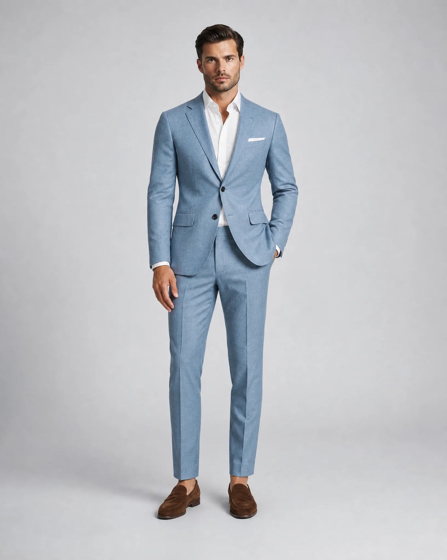 Men's aqua blue two piece linen suit with lightweight tailoring and stylish summer occasion look by ILYNORA