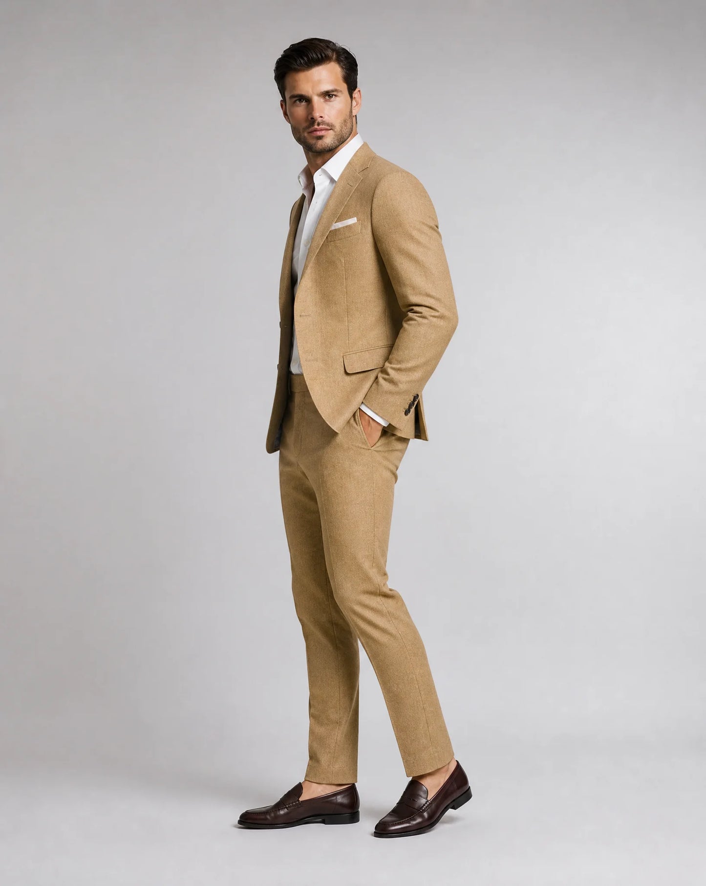 Men's light brown linen suit with breathable fabric and refined warm weather tailoring by ILYNORA