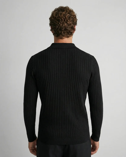 Black V-neck knit jumper by Ilynora, back view with structured knit and classic design