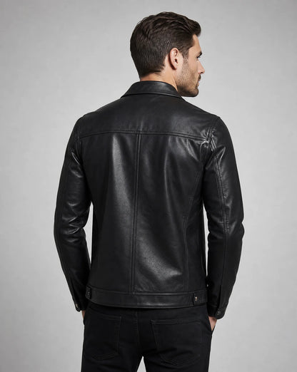 Men's black vintage leather jacket viewed from the back with premium detailing by ILYNORA