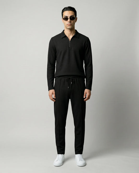 Black men’s zip lounge set by Ilynora, front view with relaxed fit and modern silhouette