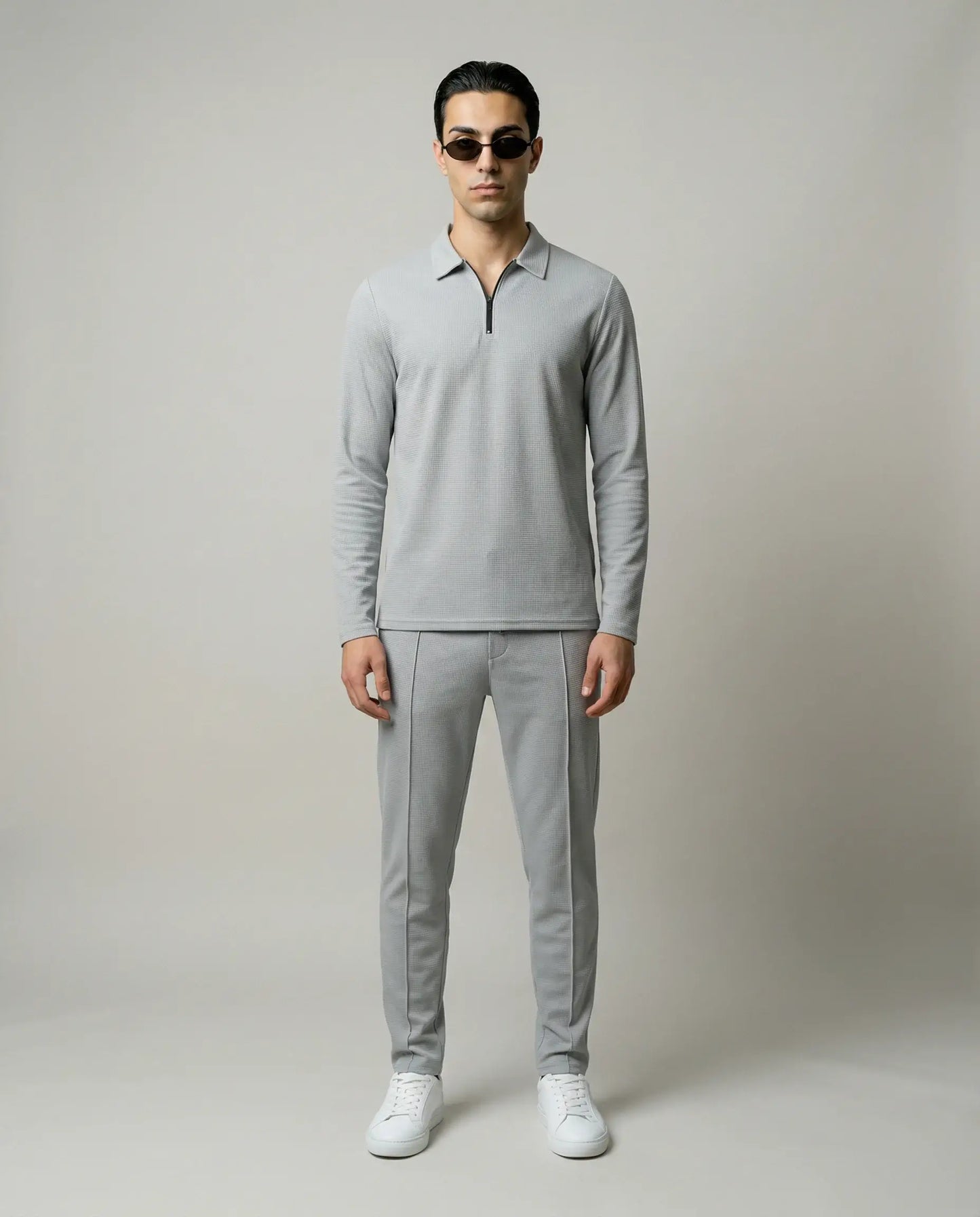 Grey men’s zip lounge set by Ilynora, front view with relaxed silhouette and everyday style