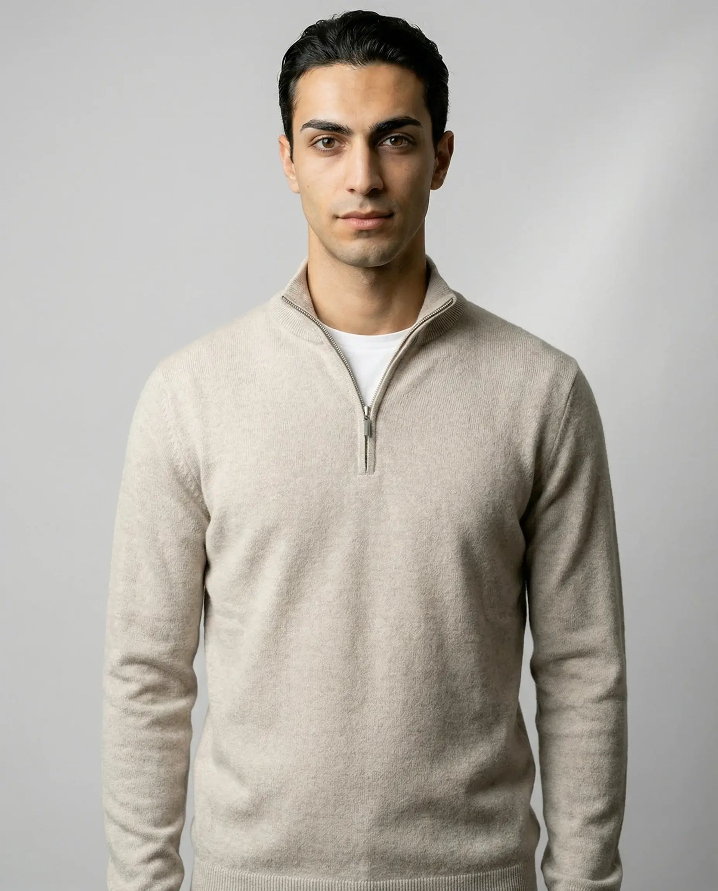 Beige zip neck knit sweater for men by Ilynora, front view with relaxed fit and refined look