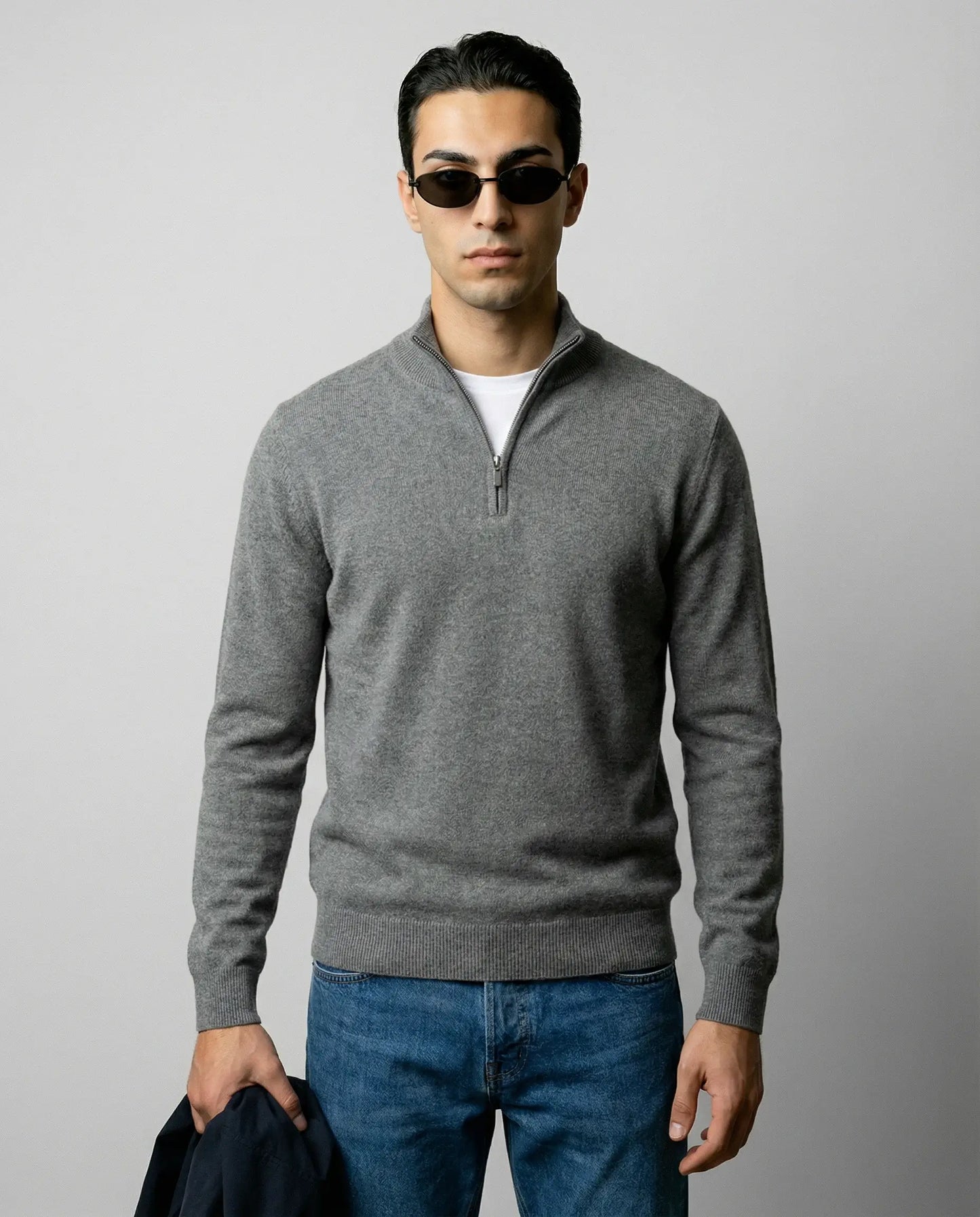 Grey zip neck knit sweater by Ilynora, front view with soft texture and modern silhouette