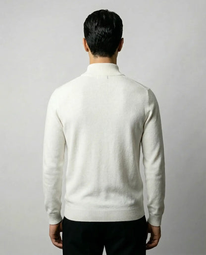 White zip neck sweater by Ilynora, back view highlighting soft knit texture and minimal silhouette