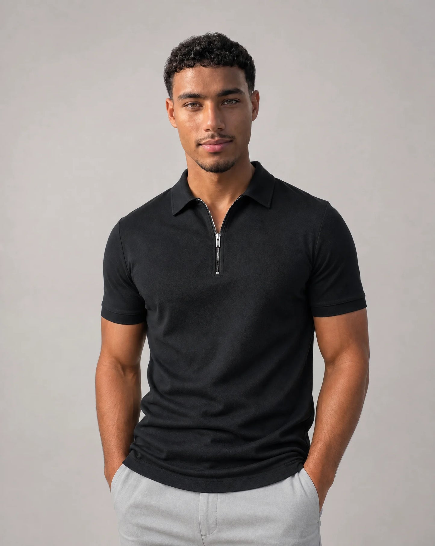 Men's black zip neck polo shirt with tailored silhouette and refined smart casual look by ILYNORA