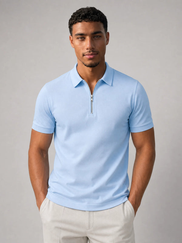 Men's light blue zip neck polo shirt with slim fit and modern smart casual style by ILYNORA