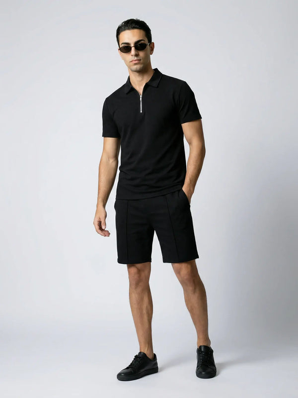 Black zip polo and shorts set for men by Ilynora, modern matching outfit with relaxed fit