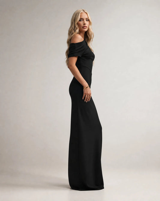 Black one shoulder maxi dress for women by Ilynora, side view highlighting the sleek fit and flowing design
