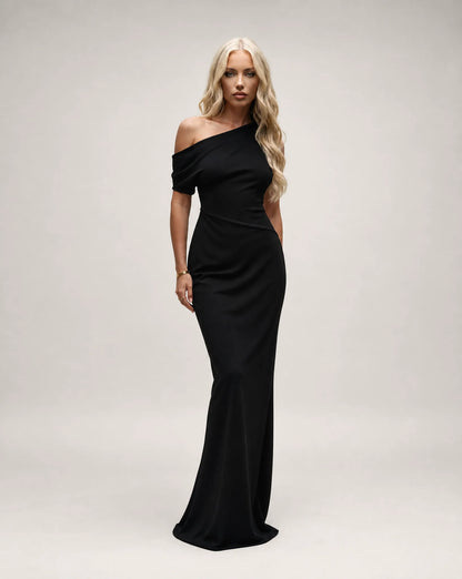 Black one shoulder maxi dress for women by Ilynora, front view with elegant silhouette and asymmetrical neckline