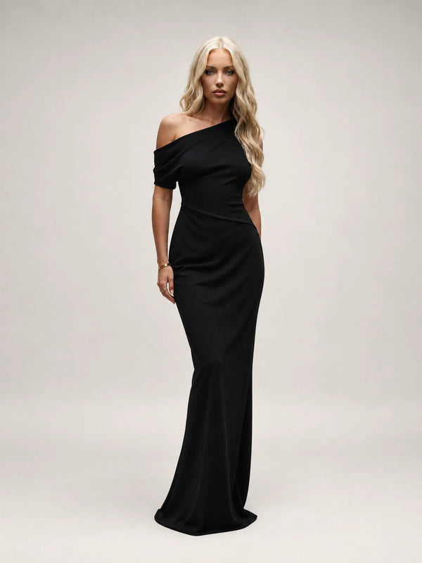 Black one shoulder maxi dress for women by Ilynora, front view with elegant silhouette and asymmetrical neckline