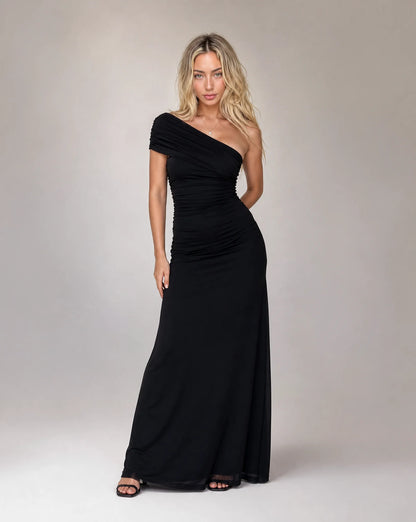 Black one shoulder ruched maxi dress for women by Ilynora, front view with sculpted fit and elegant silhouette