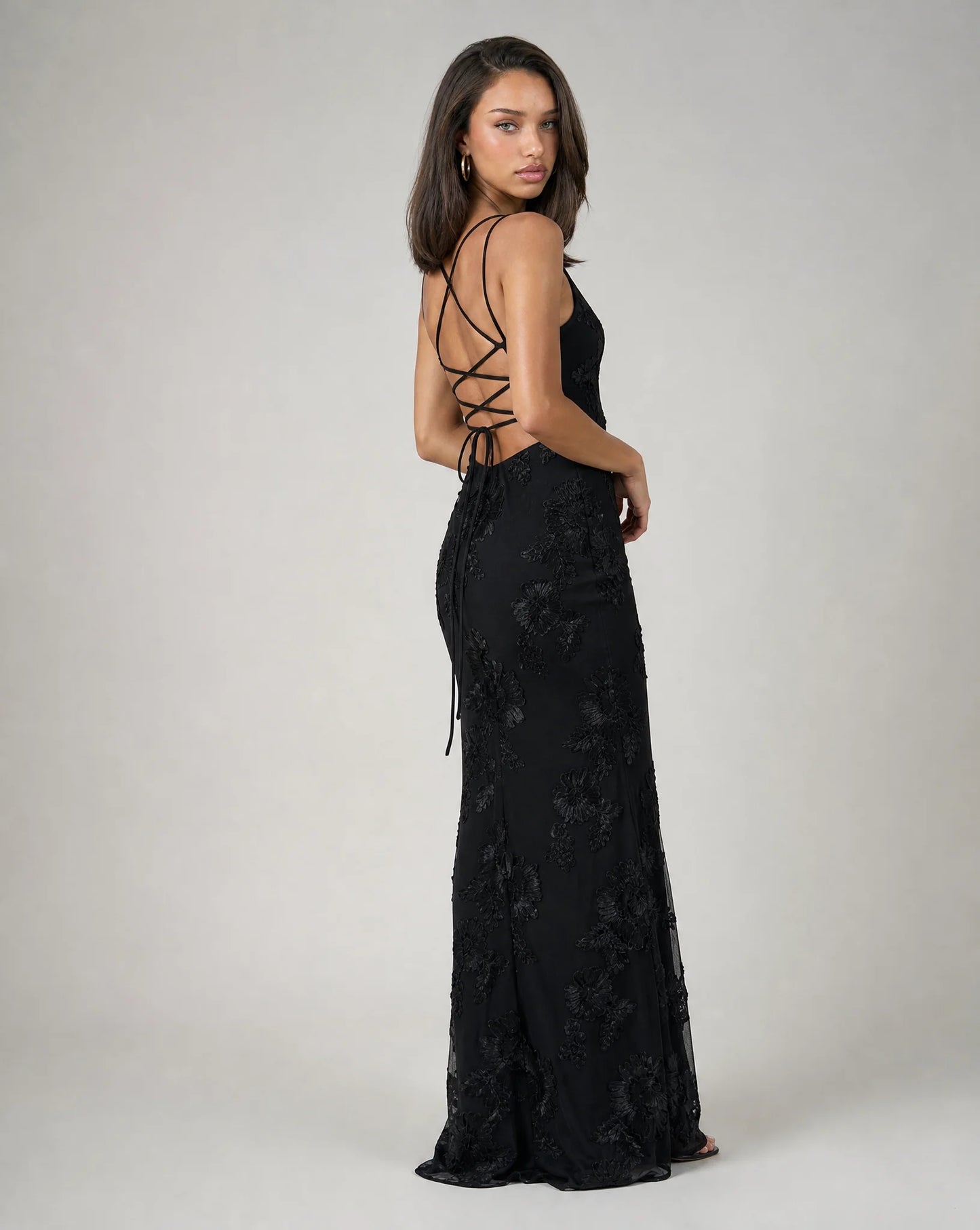 Black open back lace maxi dress for women by Ilynora, back view showcasing the elegant open back design