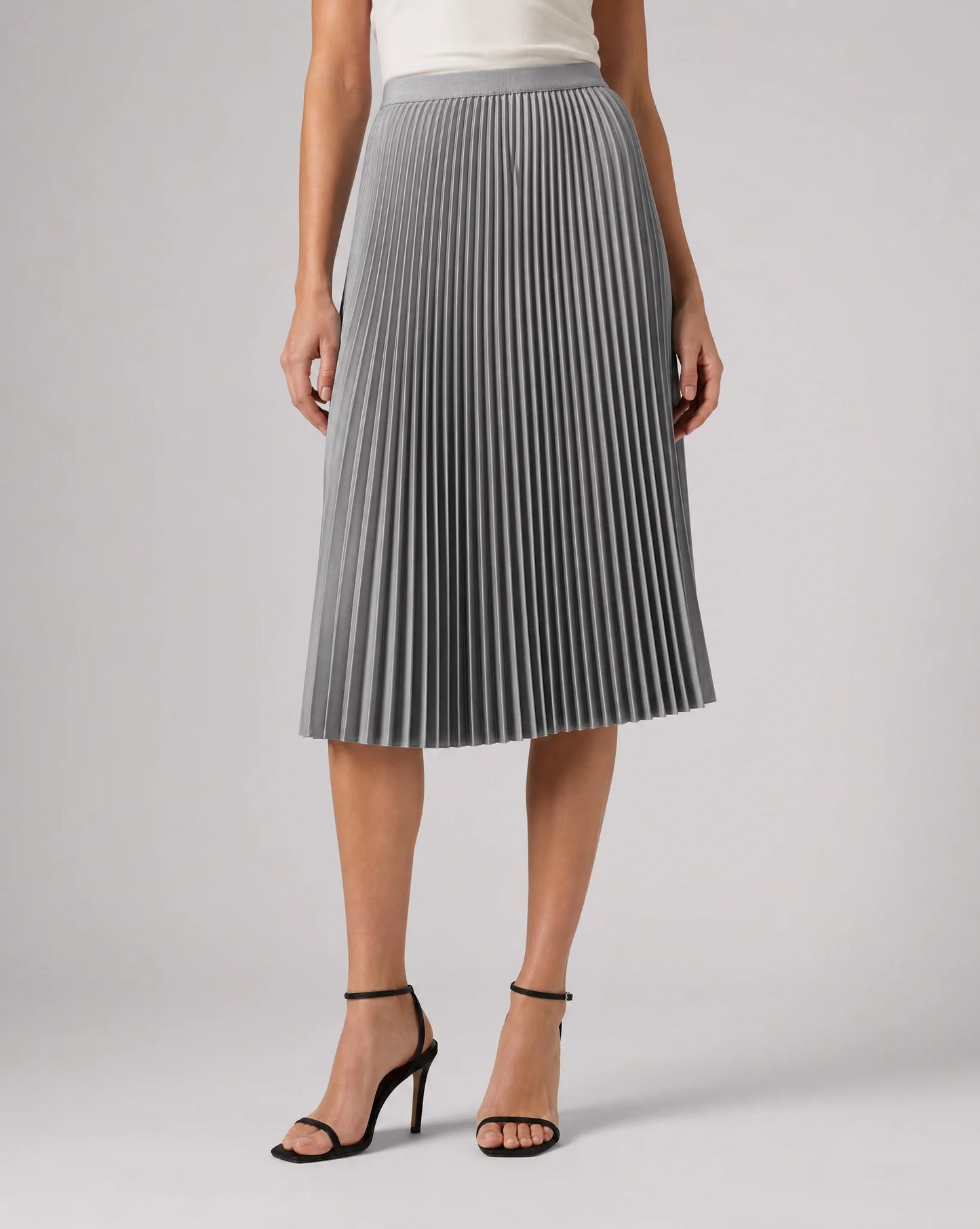 Grey pleated midi skirt for women by Ilynora, front view with elegant pleats and refined silhouette