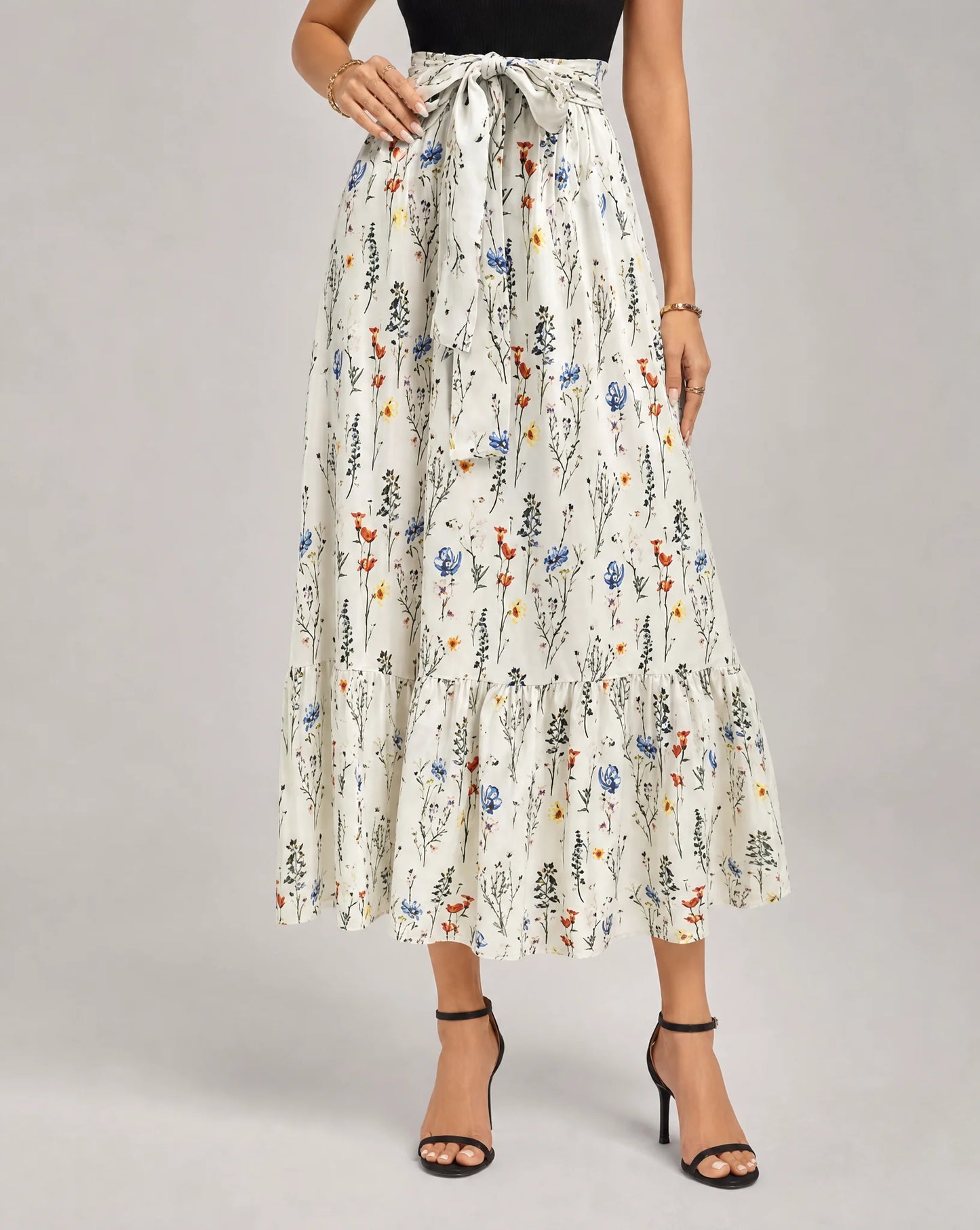 Multicolor printed A line midaxi dress for women by Ilynora, front view with elegant drape and floral design