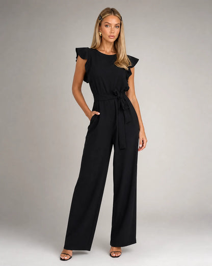 Black ruffle sleeve jumpsuit for women by Ilynora, front view with belted waist and wide leg silhouette