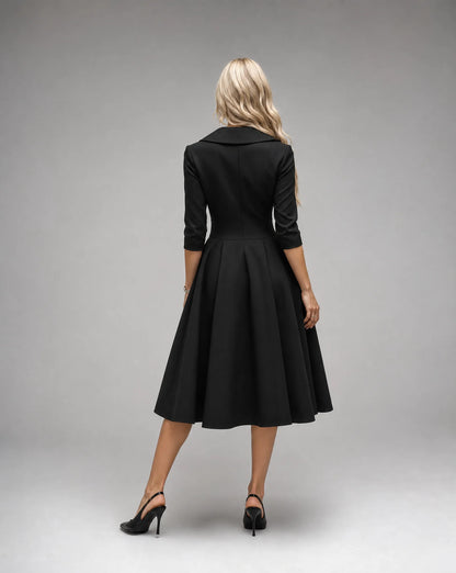 Black satin lapel midi dress for women by Ilynora, back view showcasing the flowing skirt and refined fit