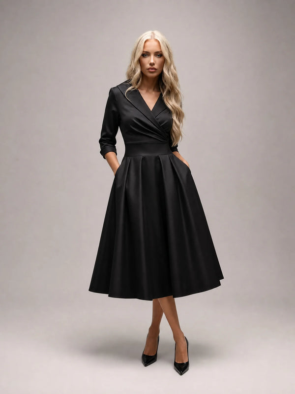 Black satin lapel midi dress for women by Ilynora, front view with elegant silhouette and structured waist