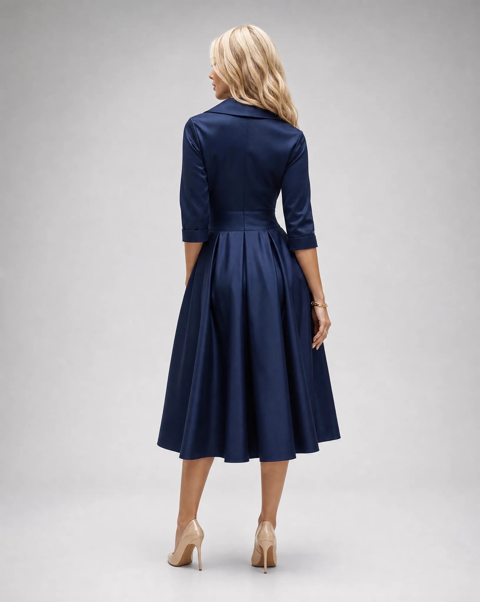 Navy satin lapel midi dress for women by Ilynora, back view with elegant drape and timeless silhouette