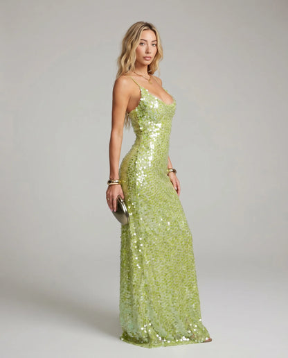 Green sequin backless maxi dress for women by Ilynora, side view with sparkling sequins and flowing fit